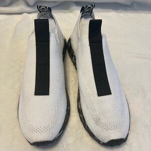 White Slip-On Sneakers with black and gray cheetah sole